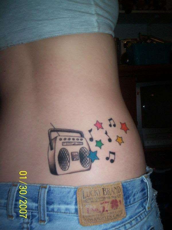 The first type of music tattoo is designs that mimic sheet music.