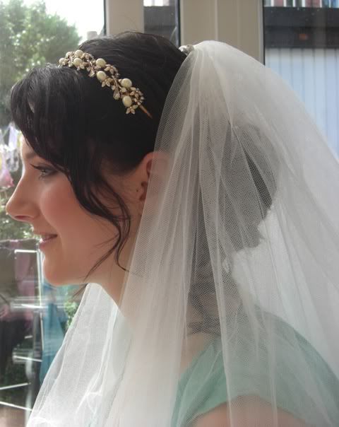 Bridal Hair With Tiara And Veil. tiara, side hair and veil